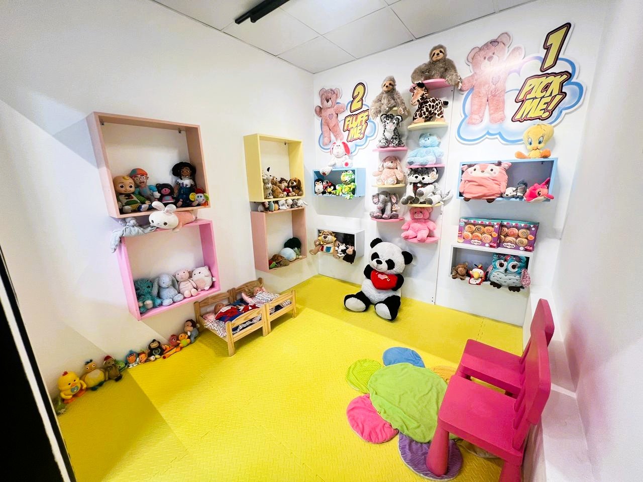 Cozy toddler soft play and sensory room at Gogo Village Dubai, featuring stuffed toys, safe padded flooring, and a calm interactive play space for young children.