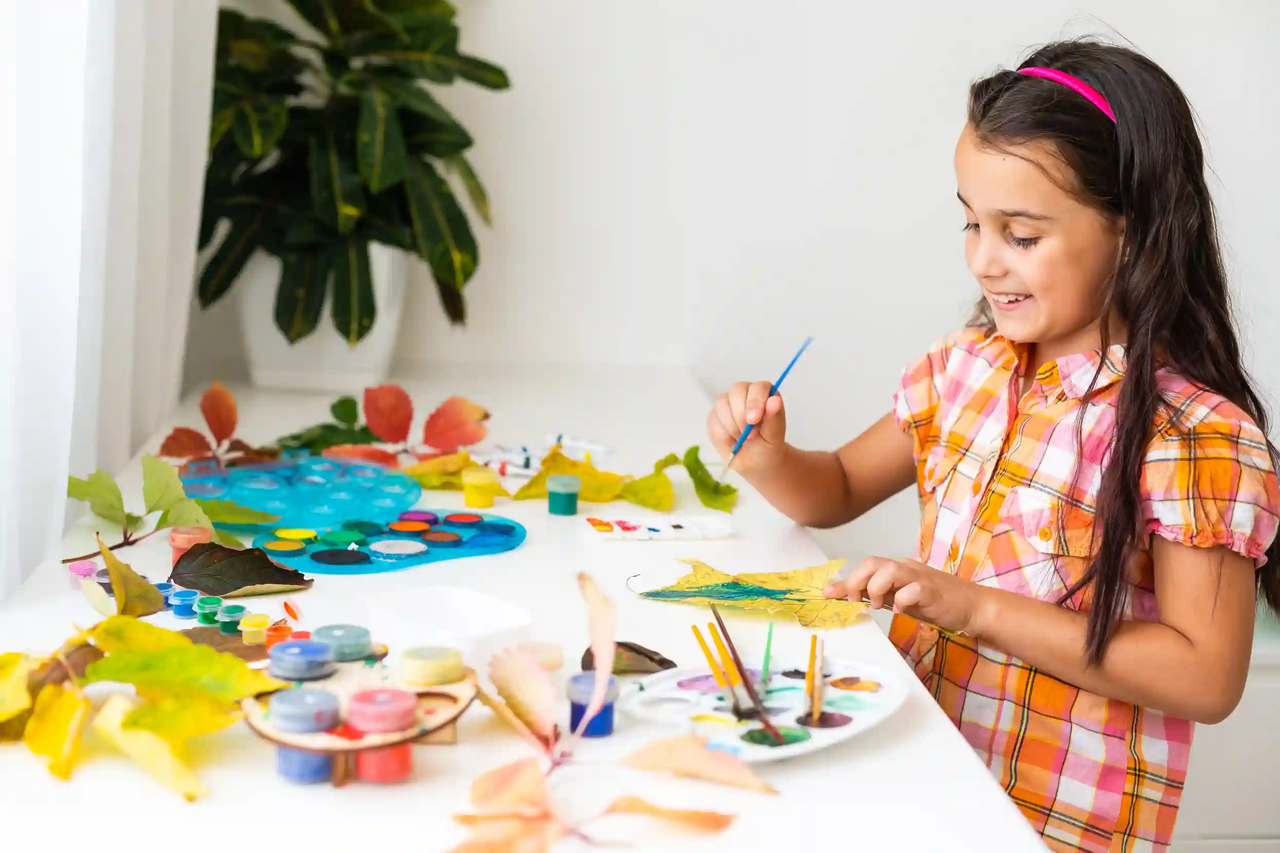 Children enjoying arts and crafts and play-based summer camp activities in Dubai